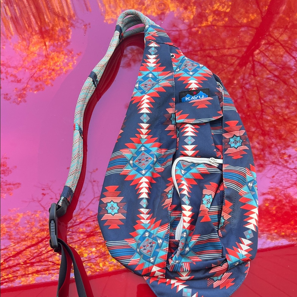 Kavu Geometric Sling Bag in Red and Blue